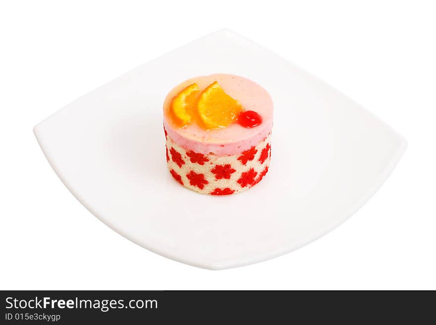 Cake with a cherry and an orange