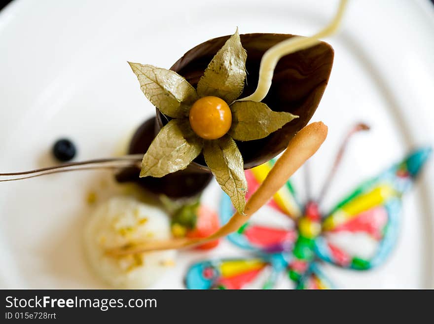 A plate of dessert with beautiful display