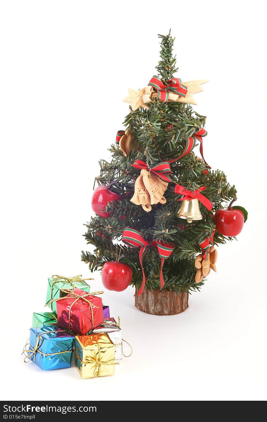 Christmas tree and color gift boxes on white background.