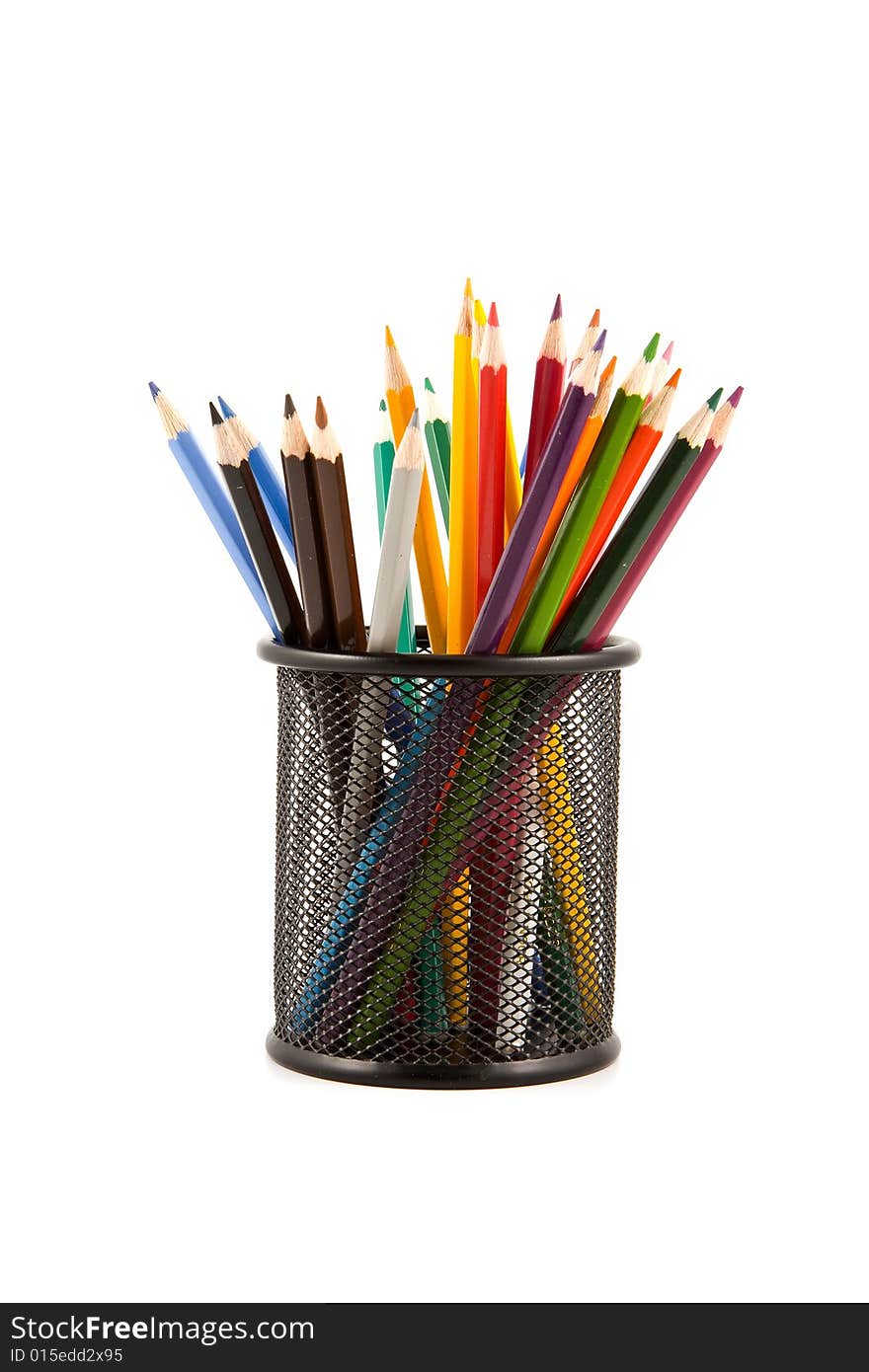 Colored wood pencils on black metal vase