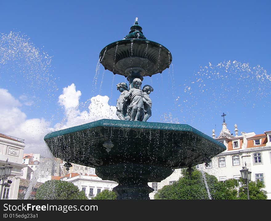 Fountain in Rossio Square, in Lisbon. Fountain in Rossio Square, in Lisbon.