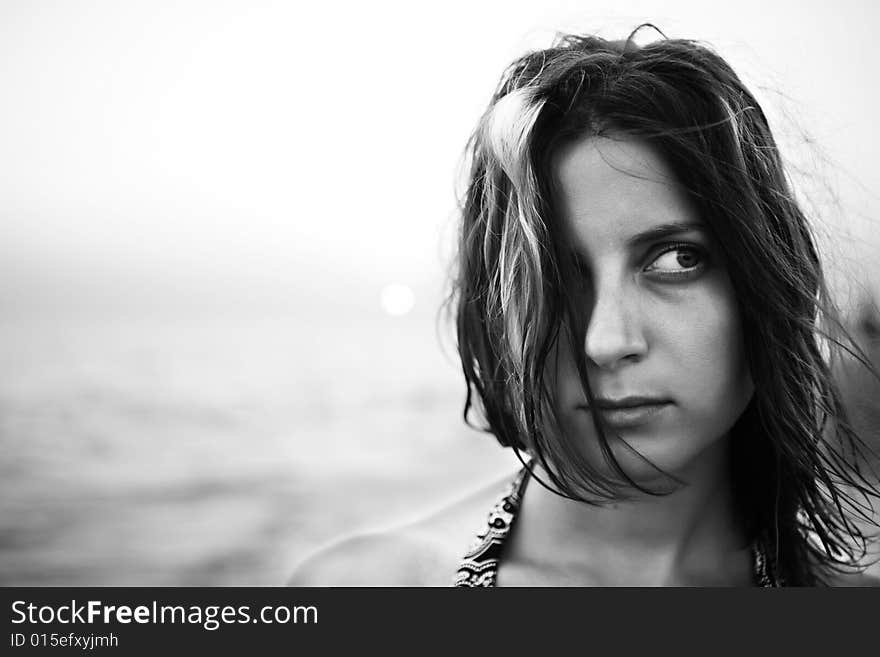 Woman with fluttering hair. bw portrait