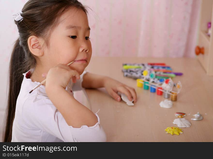 Little girl of 5 years old coloring. Little girl of 5 years old coloring