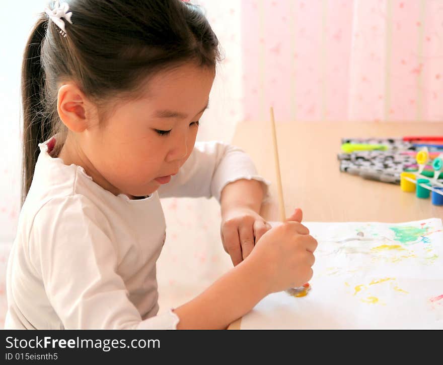 Little girl of 5 years old coloring. Little girl of 5 years old coloring