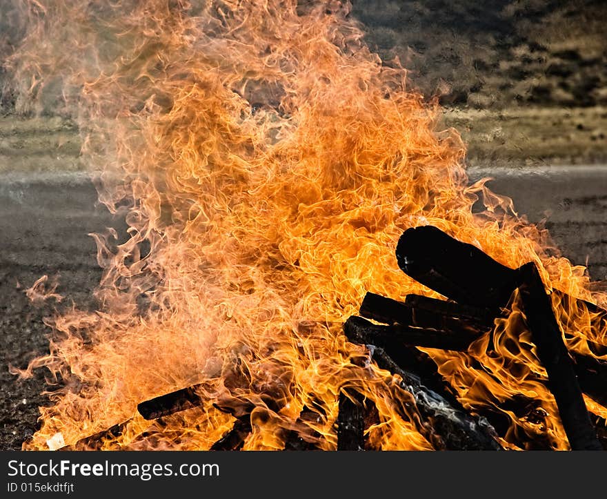 Great flame in the night, outdoors shot.