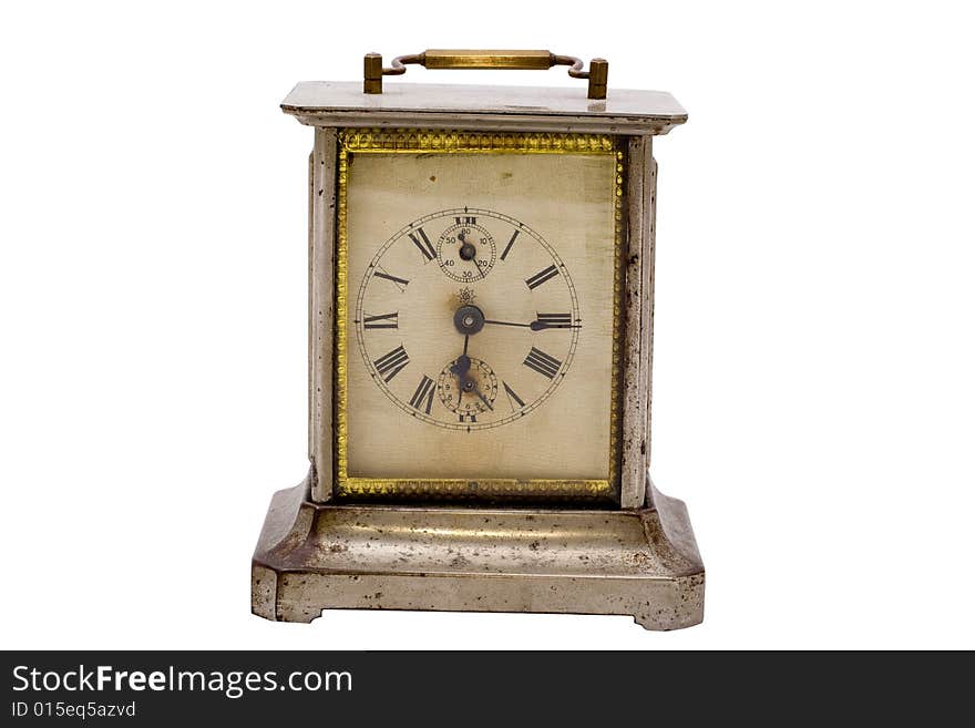 Vintage golden brass clock front view with clockface. Vintage golden brass clock front view with clockface