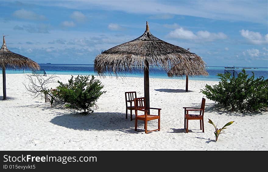 Chairs On The Paradise Beach