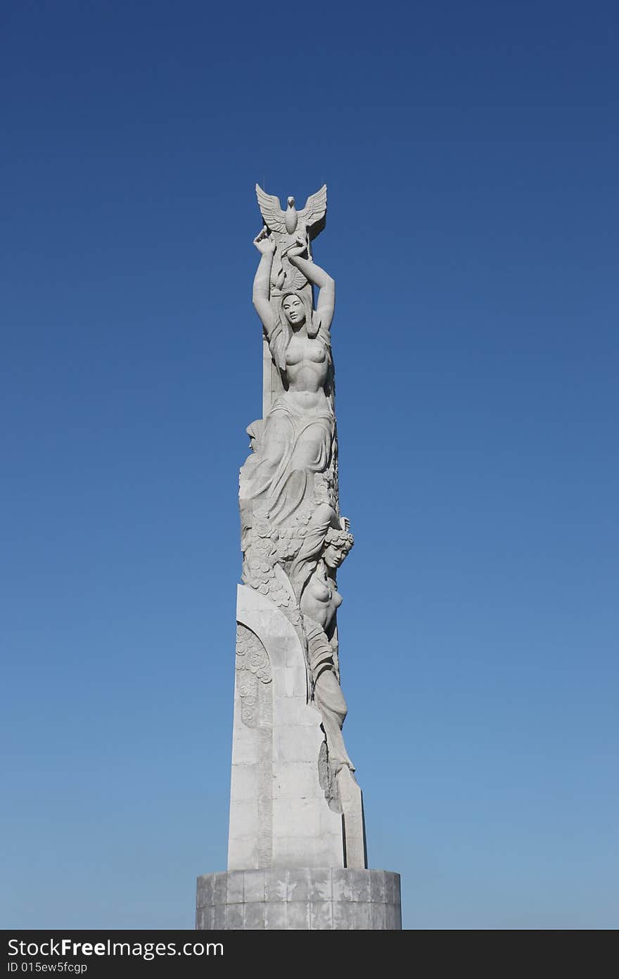 Sculpture with bird and woman