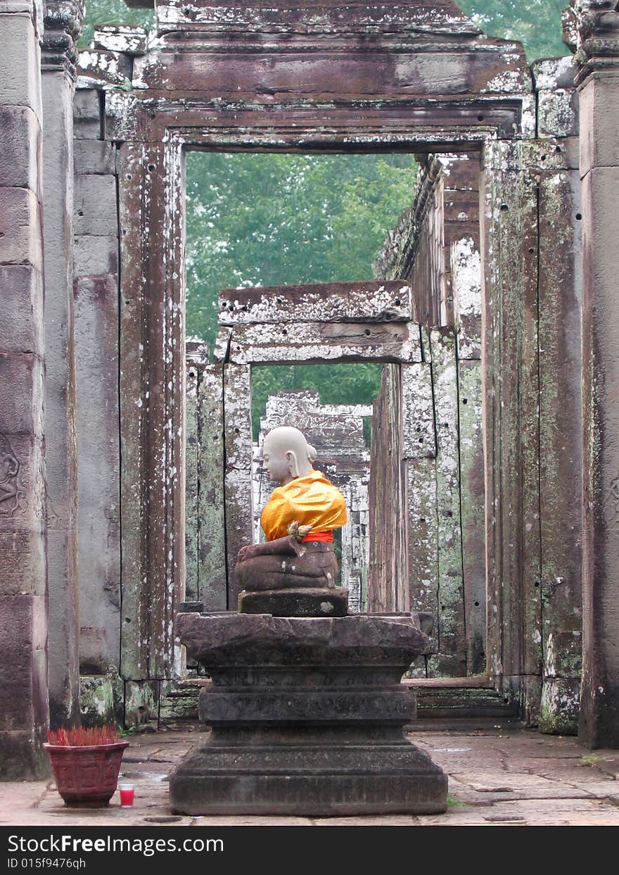 A buddha statue in a temple at Angkor Wat Cambodia. A buddha statue in a temple at Angkor Wat Cambodia