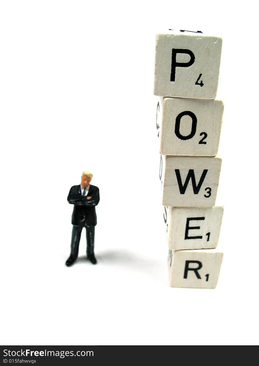 A man standing next to the word power