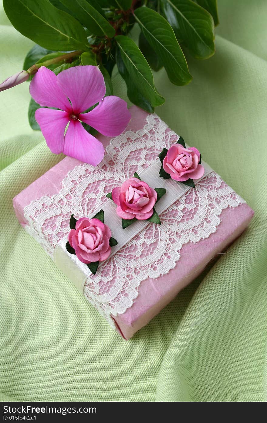 Soap gifts in pink with a fresh flower. Soap gifts in pink with a fresh flower