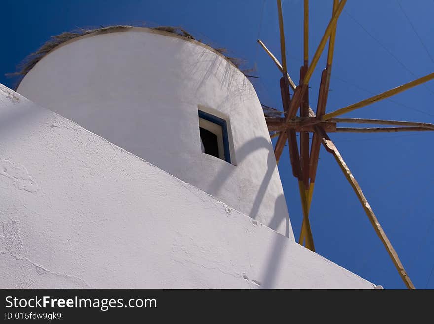 Greek view - White windmill and blue sky. Greek view - White windmill and blue sky