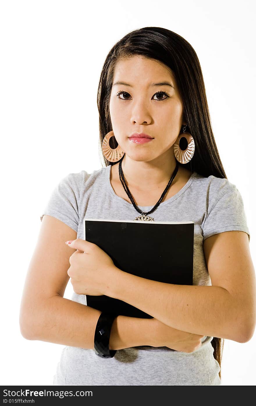 A young female model, photographed in the studio. A young female model, photographed in the studio.