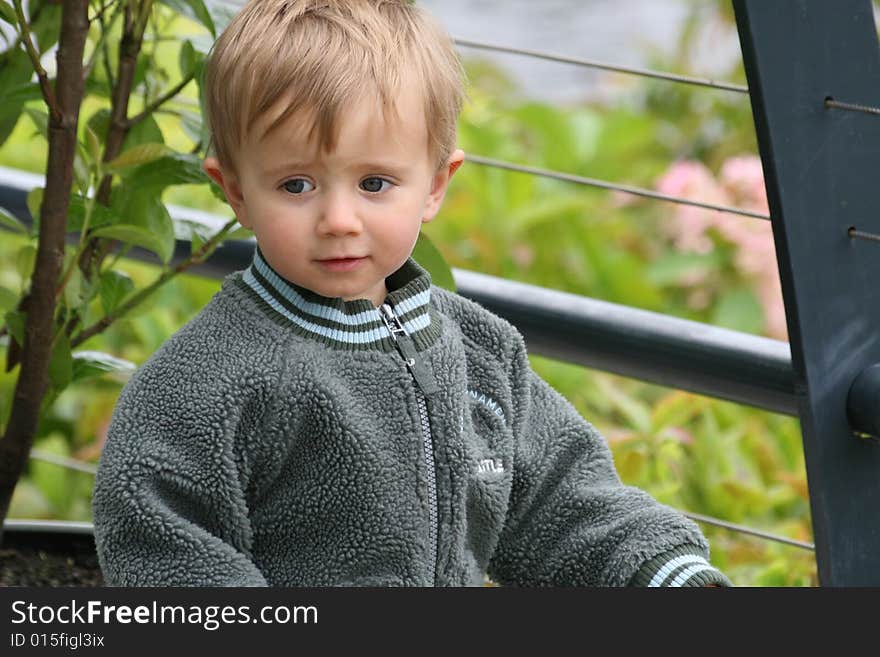 Small boy with a smiling face outdoor. Small boy with a smiling face outdoor