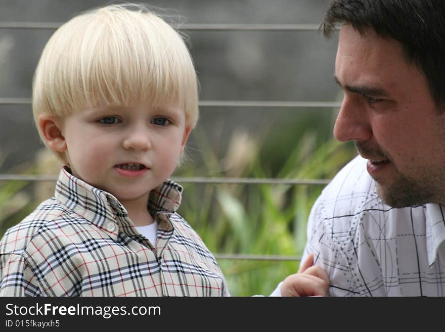 Small boy with a smiling face outdoor. Small boy with a smiling face outdoor