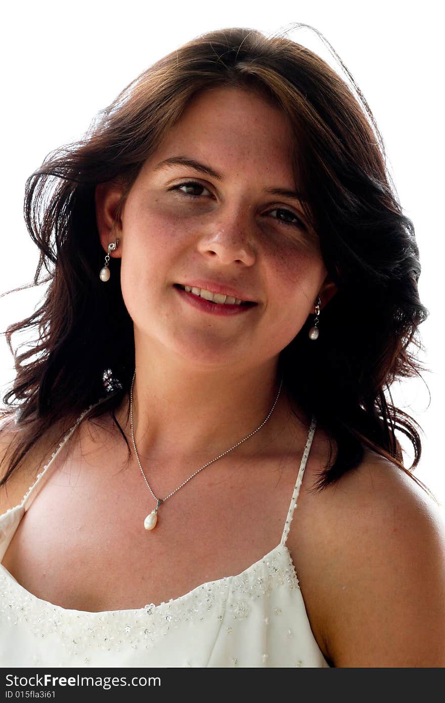 Portrait of a beautiful brunette bride on her wedding day.