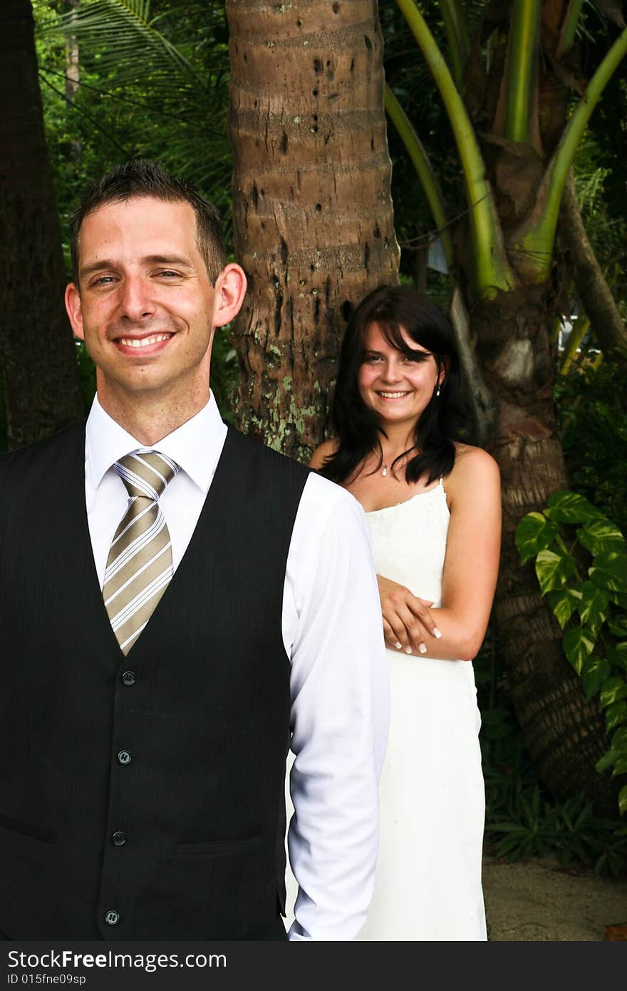 Happy bride and groom on their wedding day. Happy bride and groom on their wedding day.