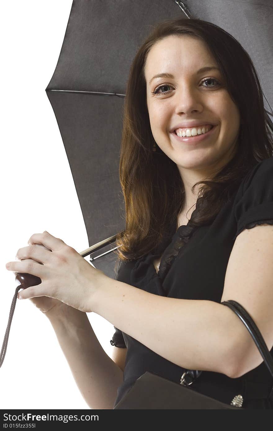 A modern dressed, young woman holding an umbrella. A modern dressed, young woman holding an umbrella