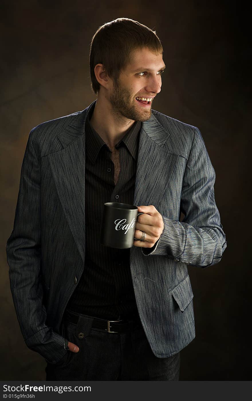 Man drinks the fragrant coffee. Man drinks the fragrant coffee