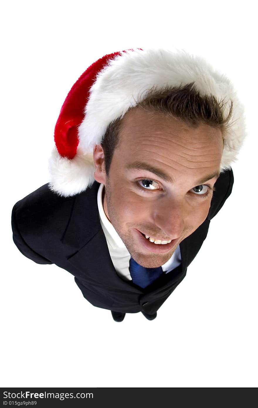 Posing businessman with christmas cap on white background