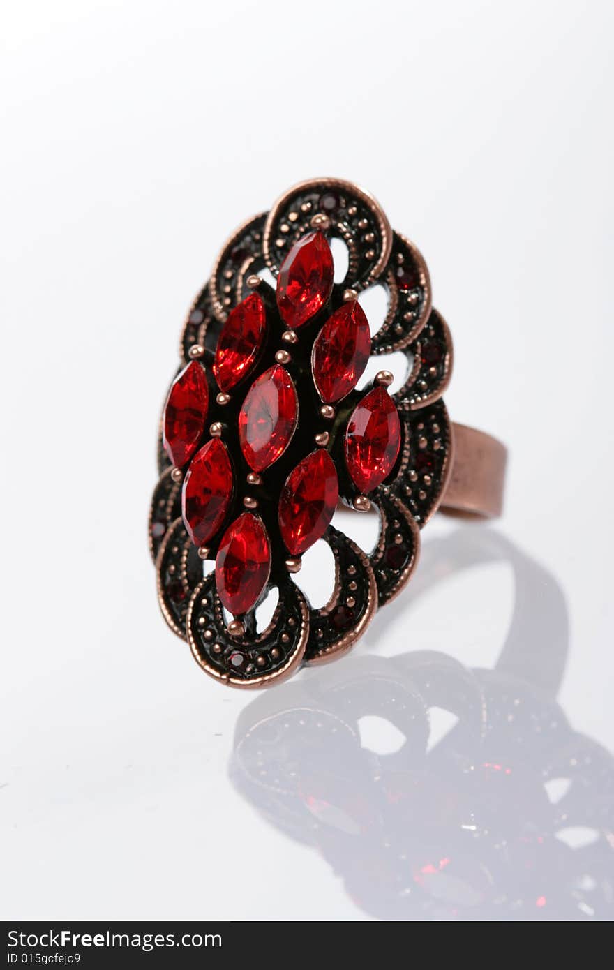 Ring with red stones