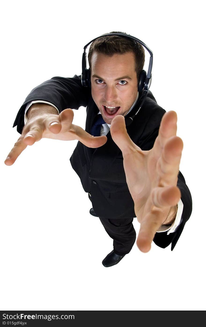 Young businessman works with microphone on white background