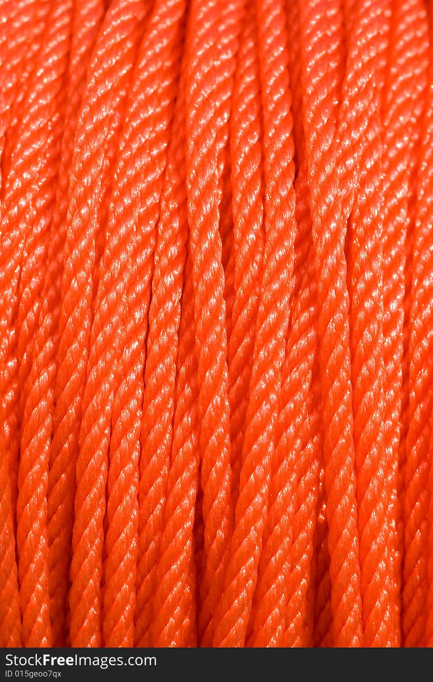 Texture created by bright red nylon ropes. Texture created by bright red nylon ropes