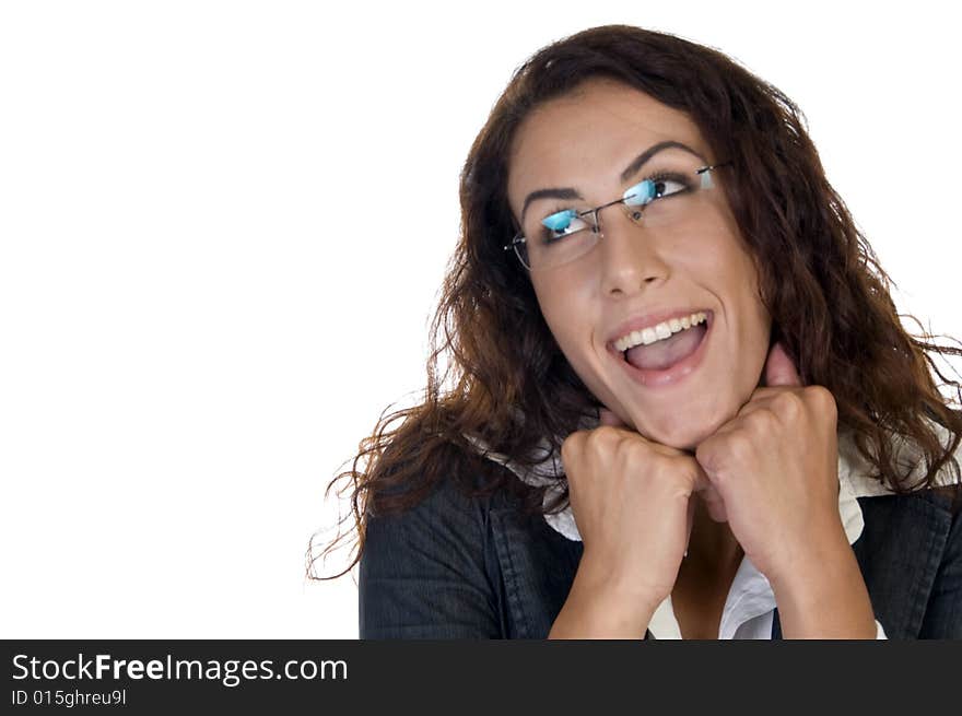 Smiling lady with chin over hands  on an isolated background