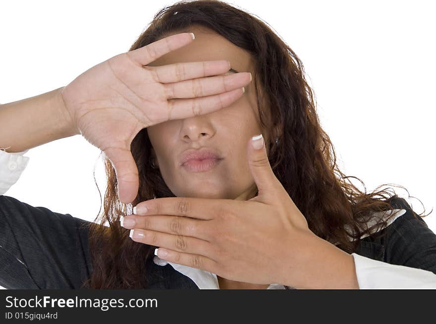 Female posing with hands on an isolated background