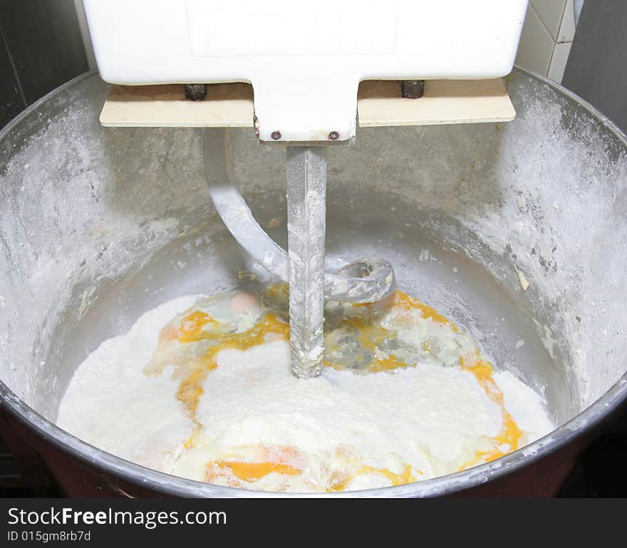 Pastry dough in mixer machine. Pastry dough in mixer machine