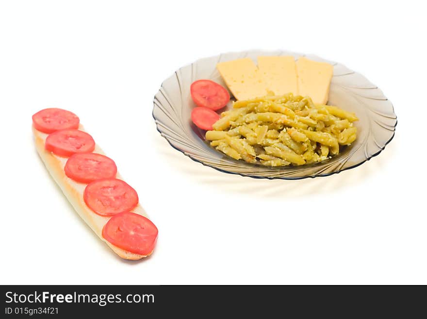 Food on plate and sandwich isolated on white