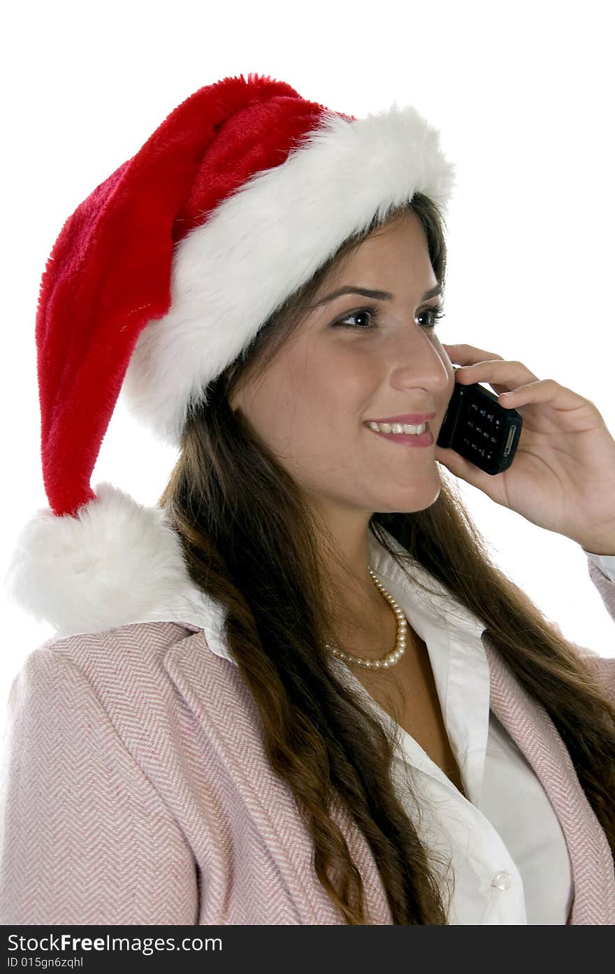 Happy woman with mobile and santacap against white background