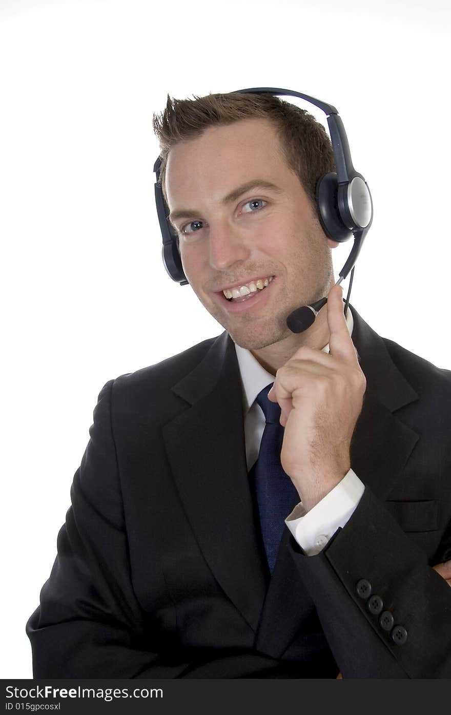 Young man calling with headset and smiling on white background