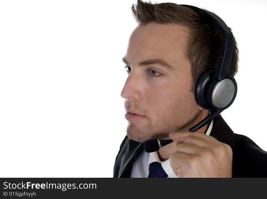 Businessman busy on phone call with white background