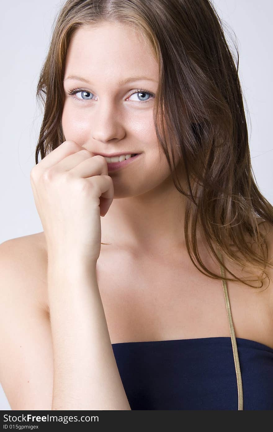 Young beautiful smiling woman on white background. Young beautiful smiling woman on white background