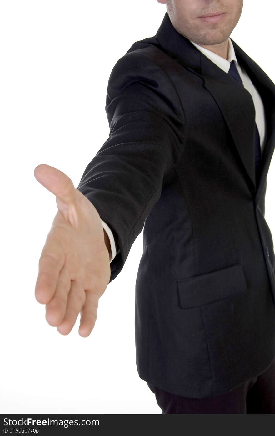 Young man in suit offering to shake the hand