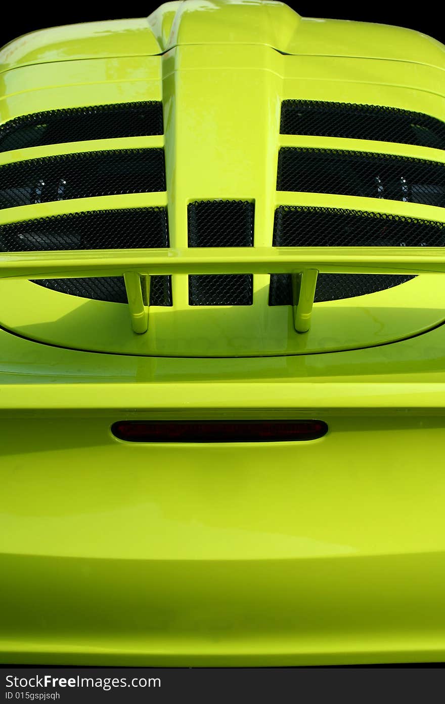 Yellow sports car rear view