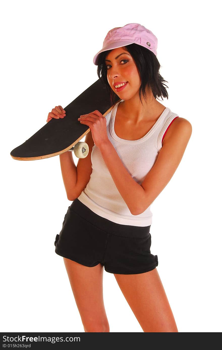 Attractive young hispanic woman holding a skateboard. Attractive young hispanic woman holding a skateboard