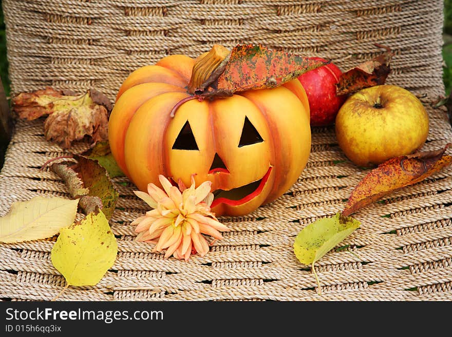 Halloween pumpkin with fruit and leaves. Halloween pumpkin with fruit and leaves.