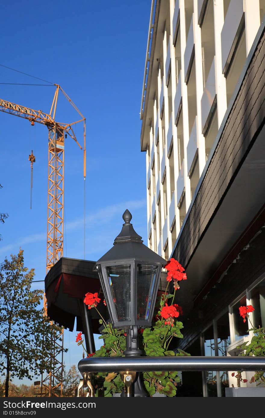 Street Lamp, Crane And Building.