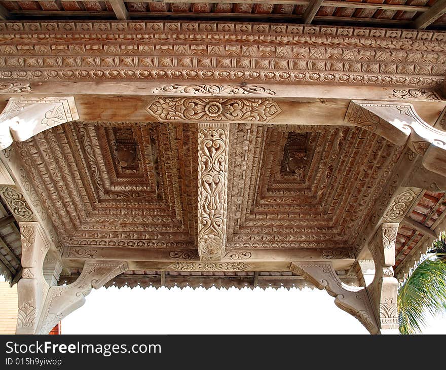 Ornate roof carving of traditional resting platform on holiday island. Ornate roof carving of traditional resting platform on holiday island