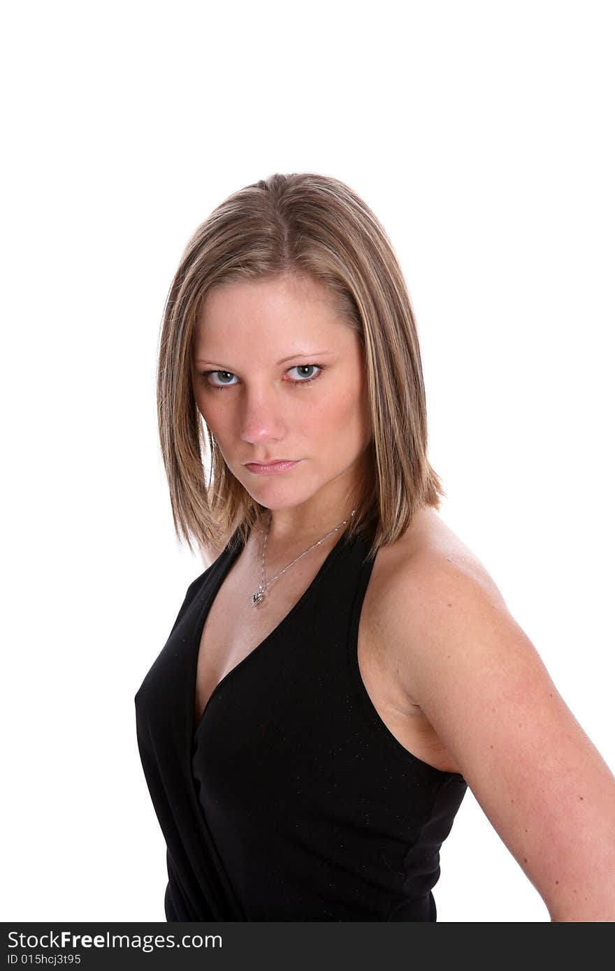 Sexy woman in black halter dress pouting for the camera. Sexy woman in black halter dress pouting for the camera.