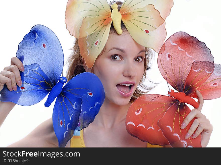 Girl with color butterflies isolated on a white ba