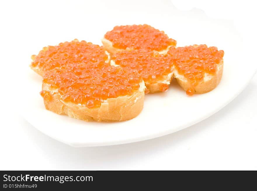 Sandwiches with caviar on plate