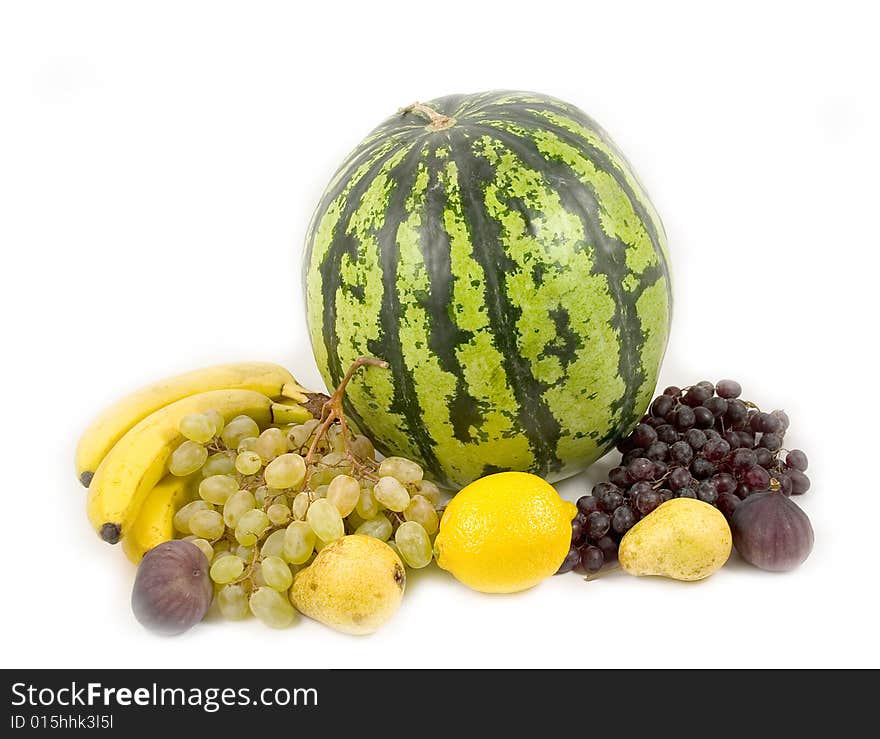 Watermelon and tasty fruit on a white background. Watermelon and tasty fruit on a white background