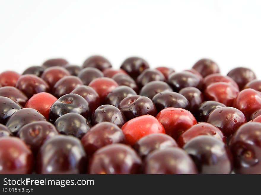 Many cherries isolated on white. Many cherries isolated on white