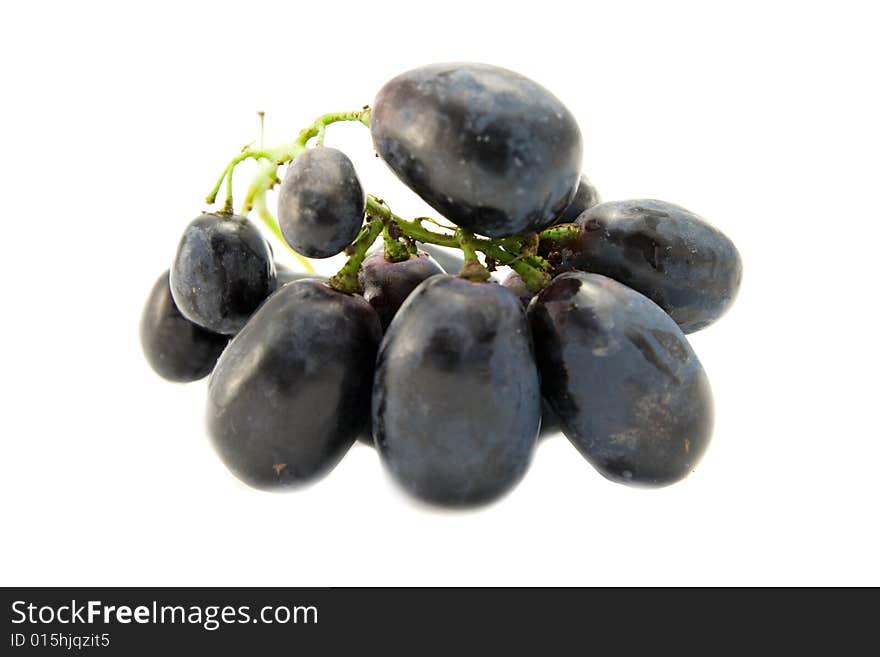 Black grapes isolated on white