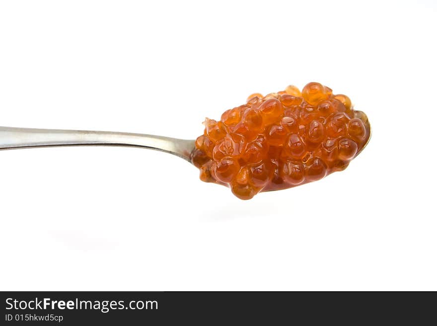 Caviar in spoon isolated on white