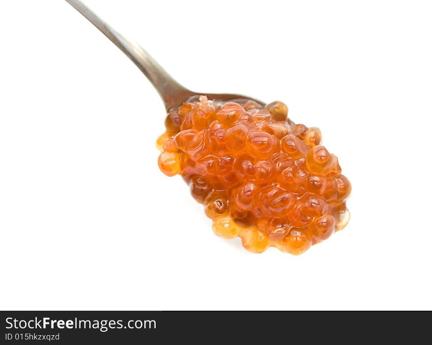 Caviar in spoon isolated on white