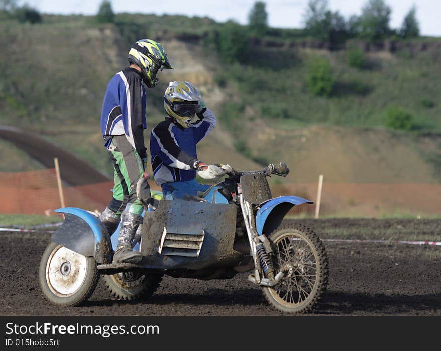 Two motorcyclists aspire to finish on road. Two motorcyclists aspire to finish on road